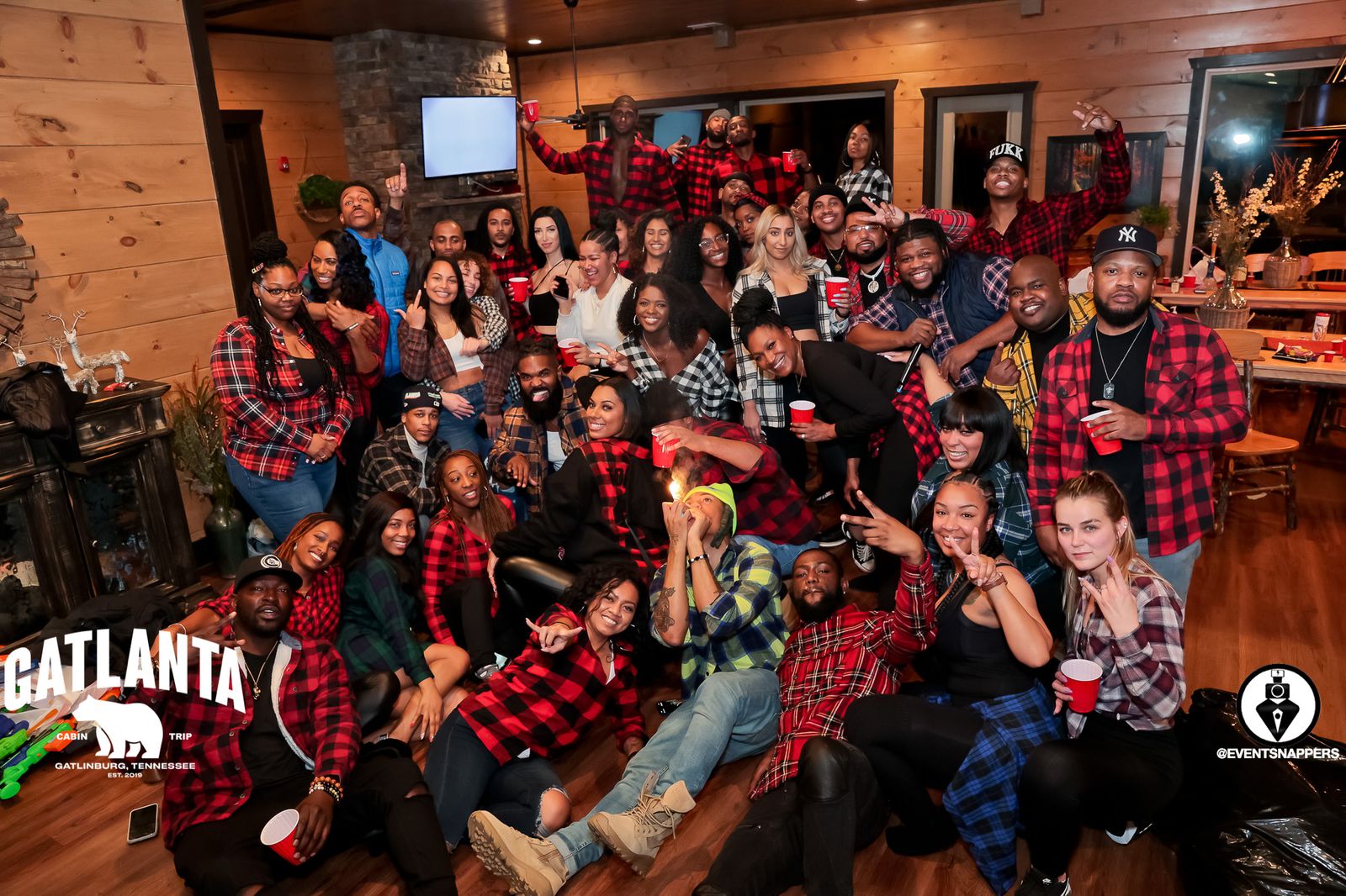 GATLANTA tribe group photo with everyone wearing plaid shirts
